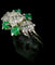 Bague 56 Bague or blanc diamant ovale de 0,70 carat et émeraudes 58 Facettes