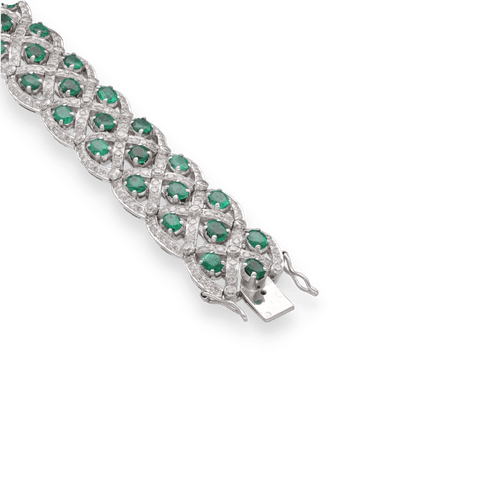 Bracelet Bracelet en or gris 18K avec 6,00 ct demeraudes ovales et 4,00 ct de diamants H-VS - 17,5 cm - Vers 2000 58 Facettes FB09597