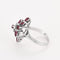 Bague 56 Bague vintage "panier" en or blanc, diamants et rubis. 58 Facettes