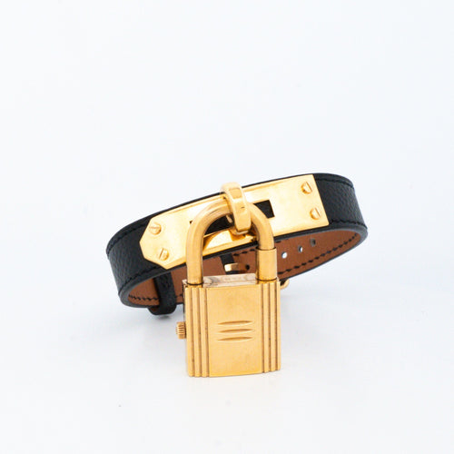 Montre Hermès - Montre Kelly en acier doré et cadran champagne 58 Facettes