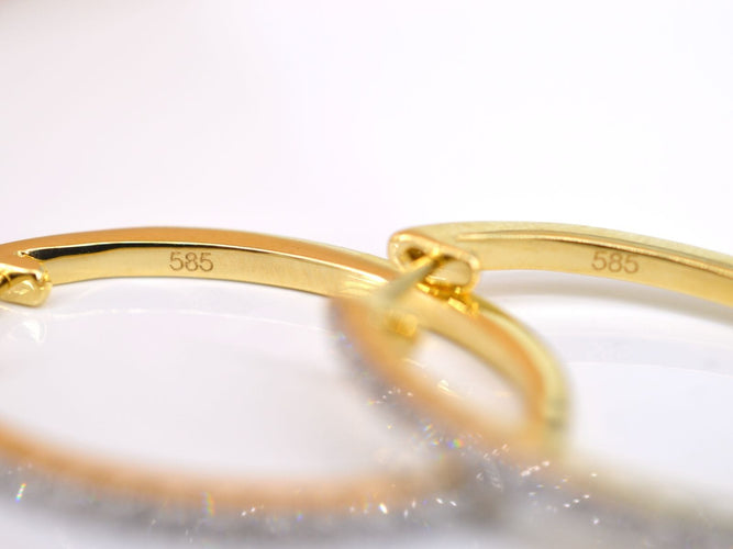 Brincos de argola em ouro com diamantes 