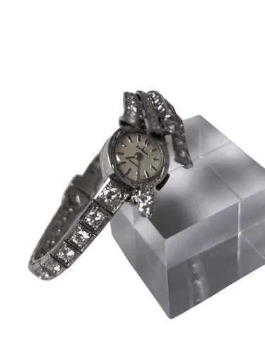 Montre Bracelet montre platine, or gris et diamants 58 Facettes 258945