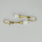 Boucles d'oreilles Boucles d'oreilles pendantes en or jaune avec quartz blanc 58 Facettes 2508003