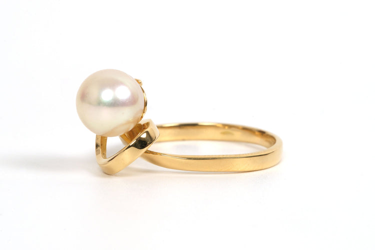 Bague 51 Bague Années 70 en or jaune 18 carats sertie d'une perle 58 Facettes 21857