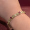 Bracelet Bracelet en or jaune 18 carats, diamants et rubis 58 Facettes 33374