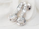 Boucles d'oreilles Paire de dormeuses anciennes en or blanc et diamants 58 Facettes 32108