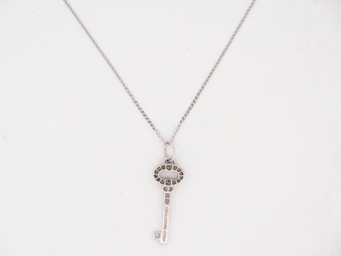 Collier collier TIFFANY & CO cle vintage ovale pendentif platine diamant 58 Facettes 258946