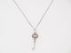Collier collier TIFFANY & CO cle vintage ovale pendentif platine diamant 58 Facettes 258946