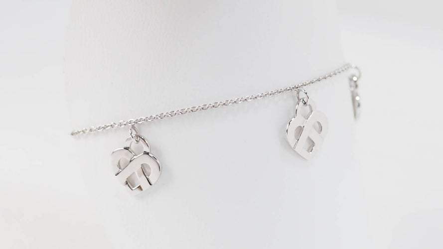 Bracelet Bracelet Poiray Coeur Entrelacé en or blanc 58 Facettes 32973