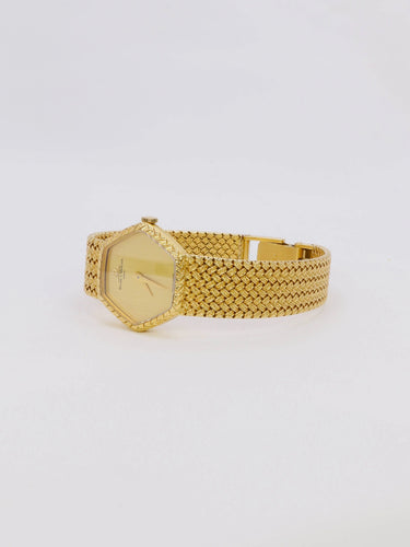Montre BAUME & MERCIER - Montre vintage or jaune maille tressée 58 Facettes 1067.3