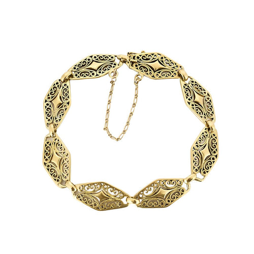 Bracelet Bracelet en or jaune ciselé et ajouré à motif de volutes 58 Facettes PAL3488X3