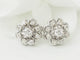 Boucles d'oreilles Boucles d'oreilles marguerites en or blanc et diamants 58 Facettes 33524