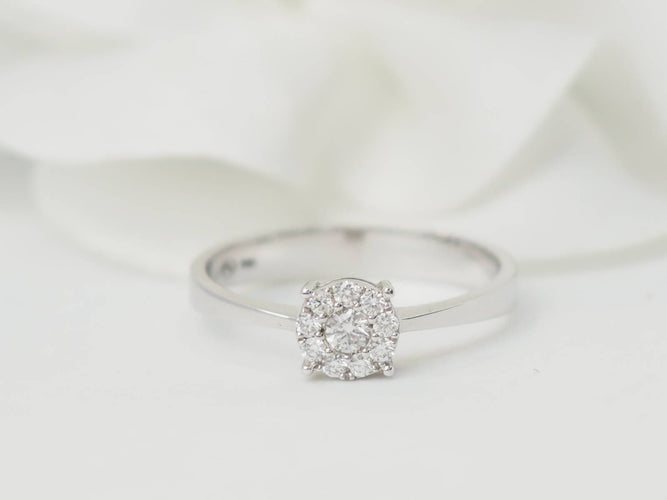 Bague 53 Bague solitaire en or blanc et diamants 0.16ct 58 Facettes 30917