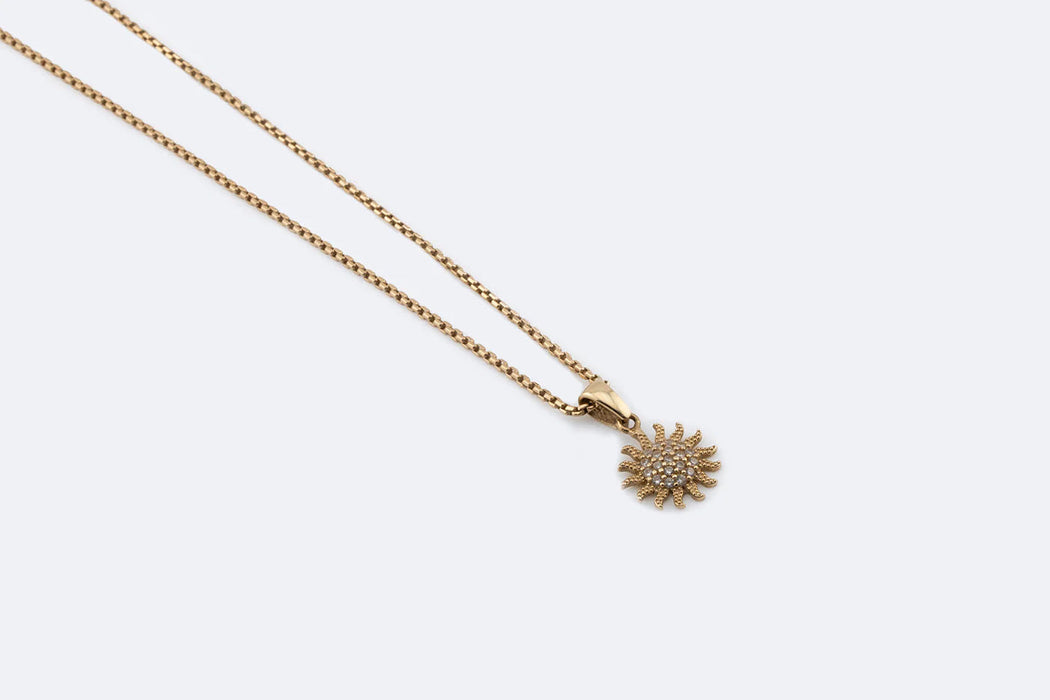 Yellow gold necklace with Sun pendant