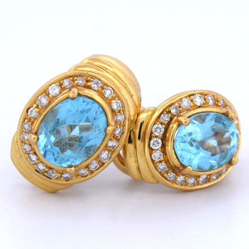 Boucles d'oreilles Boucles d'oreilles Damiani en or jaune 18 carats avec topaze bleue et diamants 58 Facettes OR203