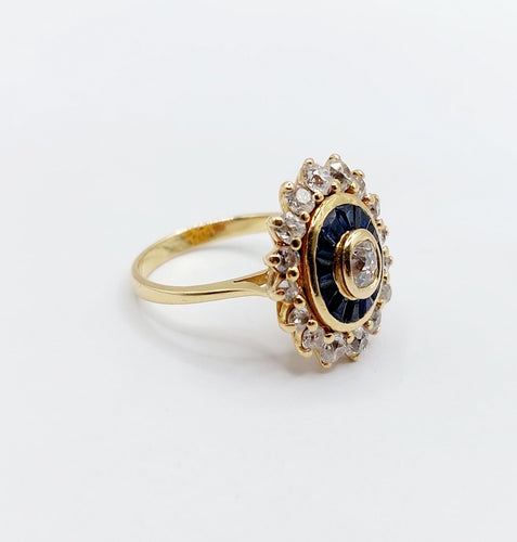 Bague 54 Bague marguerite art déco or jaune, diamants et saphir calibrés 58 Facettes A05533