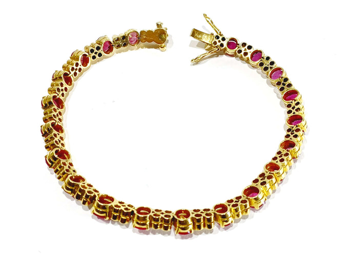 Pulsera de oro amarillo con diamantes rubí