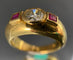 Bague 54 Bague or jaune sertie d'un diamant de 0,85 carat et de deux rubis 58 Facettes