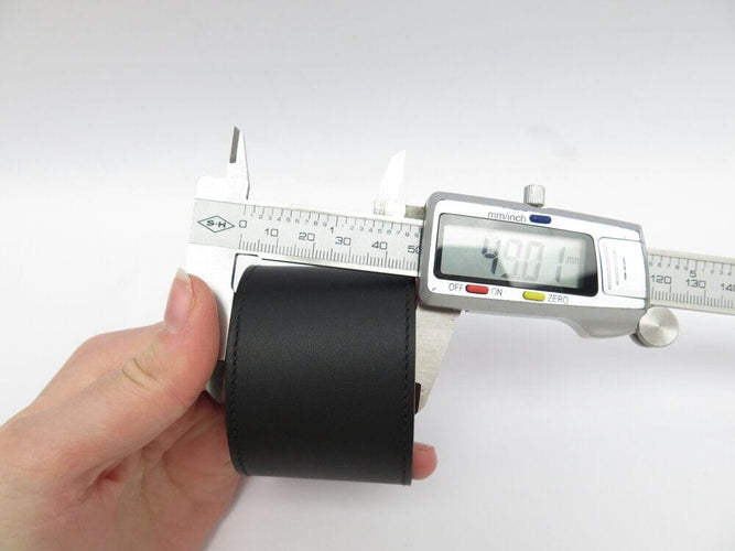 Bracelet bracelet HERMES extreme kelly dog manchette en cuir noir 50mm 58 Facettes 267199