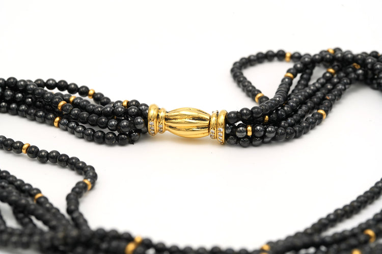 Collier Collier en perles d'hématite, diamants et or jaune 58 Facettes 13822