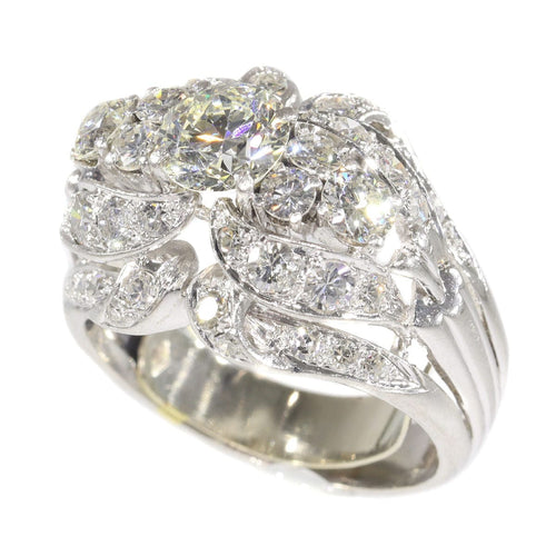 Bague 59 Échos de la mode des années 1950 : bague en platine et diamant 58 Facettes 21174-0487