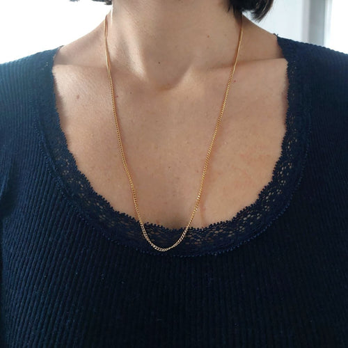 Collier Longue chaîne à maille gourmette en or jaune 18k 58 Facettes 229