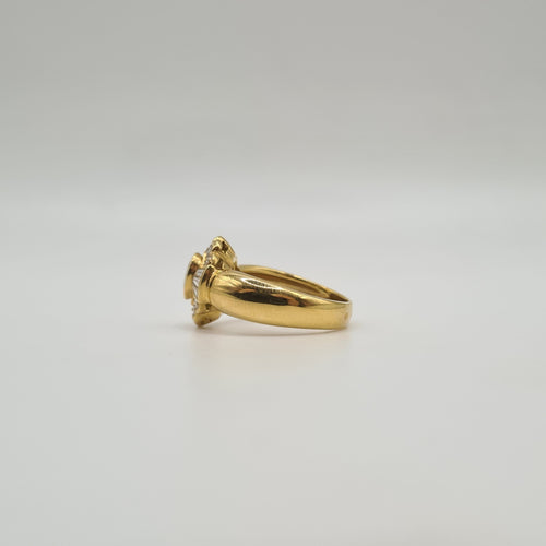 Bague 54 Bague fleur or jaune sertie d'émeraudes, diamants 58 Facettes