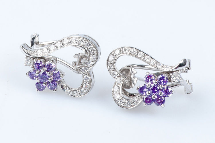 Bague Bague coeurs et fleurs en or blanc 18 carats 58 Facettes 111.20995-53