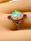 Bague 53 Bague en or jaune, opale, diamants et rubis. Vers 1900. 58 Facettes AB639