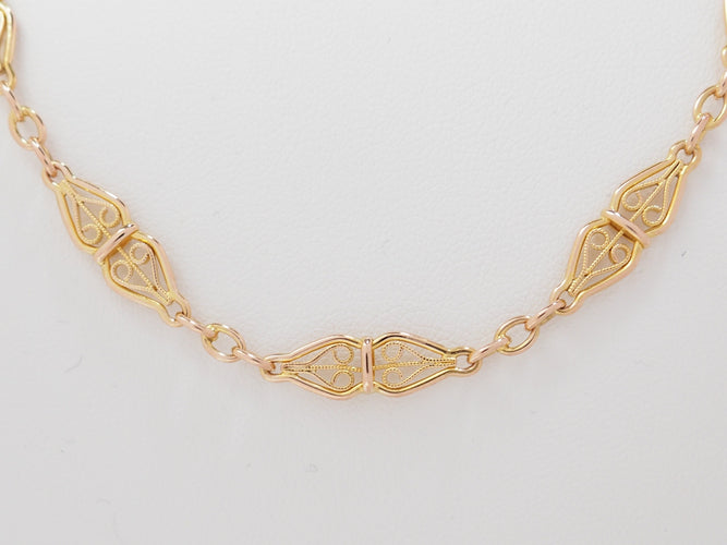 Collier Collier maille filigrane en or jaune 58 Facettes 33512