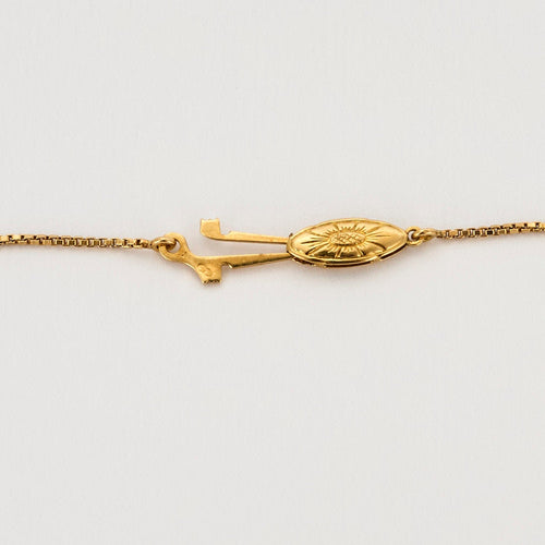 Колие от жълто злато с гранати