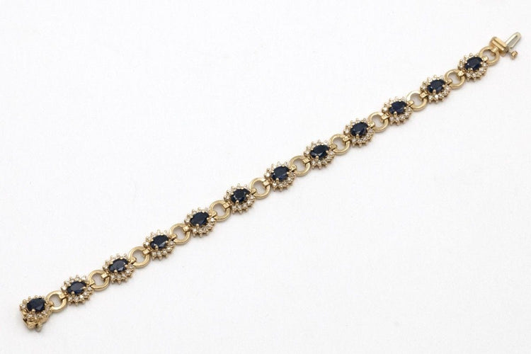Bracelet Bracelet exclusif en or jaune 14k avec saphirs et diamants 58 Facettes 11393