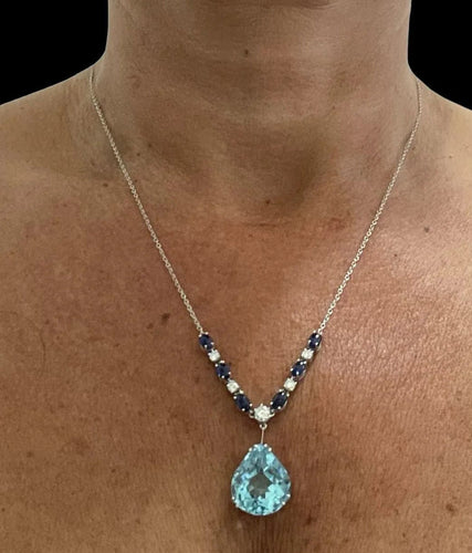 Collier Collier pendentif vintage en saphir et diamant aigue-marine 12 carats 58 Facettes