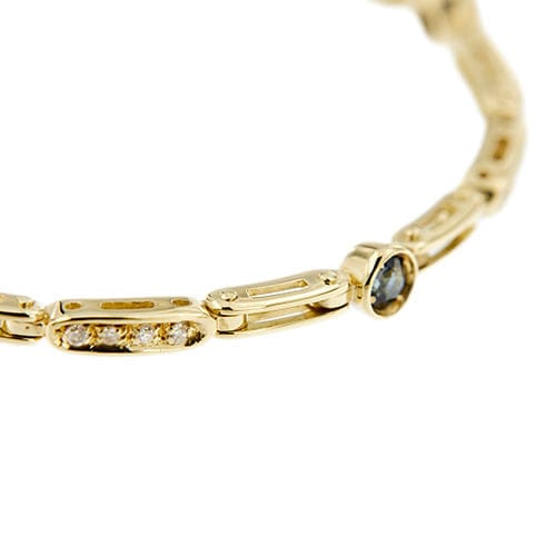 Geelgouden armband met segmenten, saffieren en diamanten 