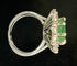 Bague 56 Bague or blanc sertie d'une émeraude de 4 carats entourée de 2,40 carats de brillants 58 Facettes