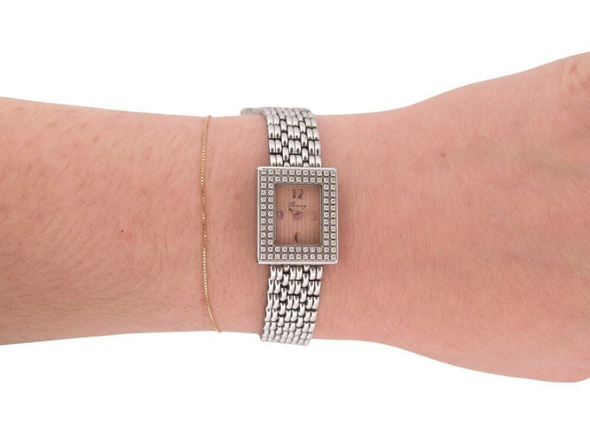 Montre vintage montre POIRAY sertie de 80 diamants 21 mm quartz classique acier 58 Facettes 268175