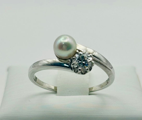 Bague 55 Bague « To and Me » en or blanc avec perle et diamant 58 Facettes 50322