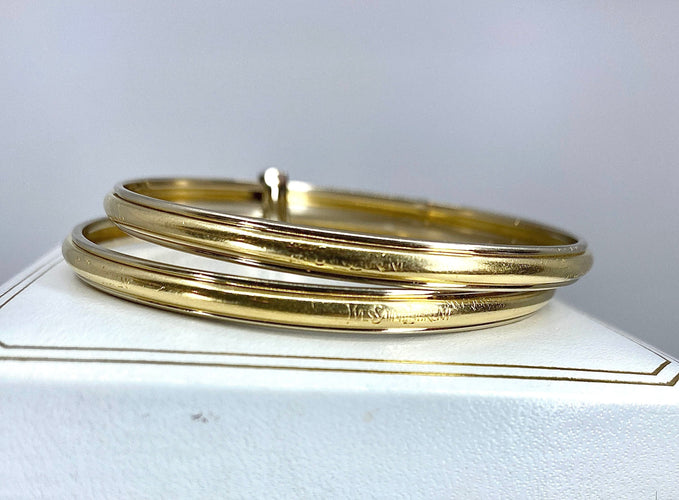 Bracelet Bracelet double joncs, or blanc, diamants, Yves Saint Laurent 58 Facettes AB601