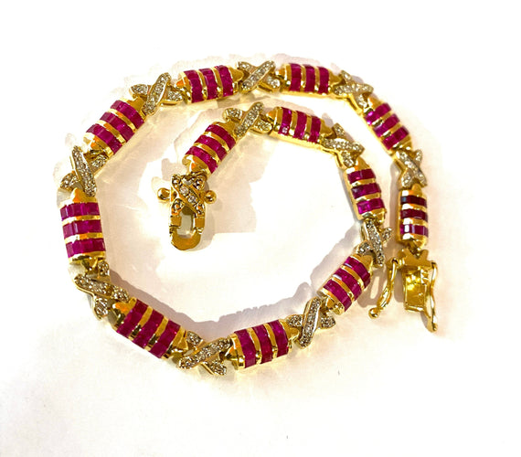 Bracelet Bracelet en or jaune, rubis calibrés et diamants 58 Facettes AB620