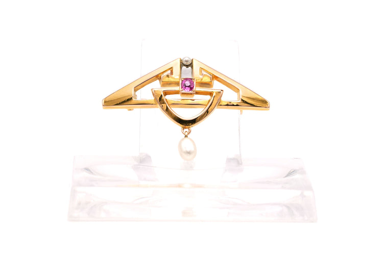Broche Broche Art Déco en or jaune 18 carats sertie d'un saphir rose et de perles 58 Facettes 20327