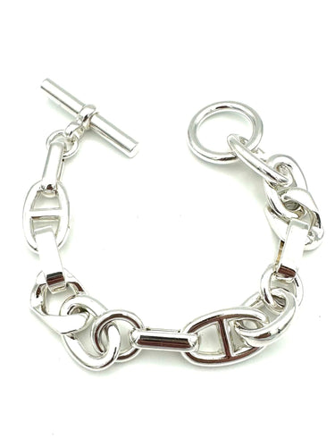 Bracelet HERMES. Collection "Aléas" bracelet argent 925/00 PM 58 Facettes