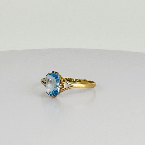 Bague Bague en or jaune avec topaze bleue ovale 58 Facettes 2508021
