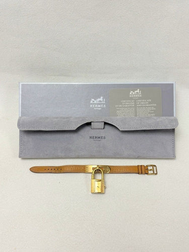 Montre Hermès - Montre Kelly en plaqué or, bracelet cuir camel 58 Facettes WC-2025-2302