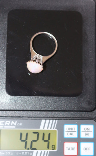 Bague 51 Bague en or blanc Opale et diamants 58 Facettes 585