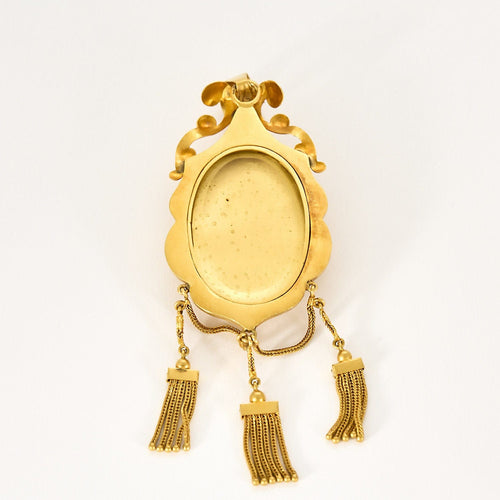 Pendentif Pendentif porte souvenir en or jaune 58 Facettes HOU5531