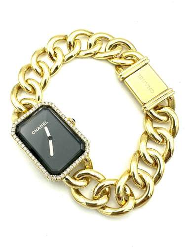 Montre CHANEL. Collection "Première chaine gourmette", montre en or jaune 18K 58 Facettes