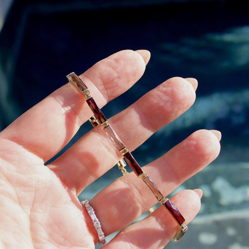 Montre Bracelet vintage en or 14 carats avec grenat et quartz fumé 58 Facettes A2000P