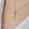 Pendentif Pendentif Dior en or jaune - Fleur émaillée et diamant 58 Facettes 32178