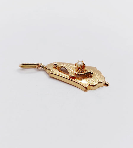 Pendentif Pendentif or rose, or jaune orné d'une perle (circa 1900) 58 Facettes A06292
