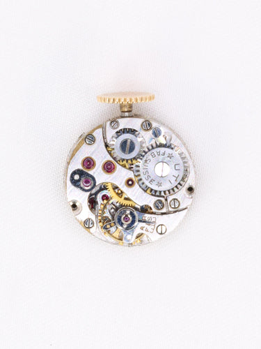 Montre UTI - Montre à secret tubogas or jaune diamants rubis calibrés 58 Facettes 1153.5